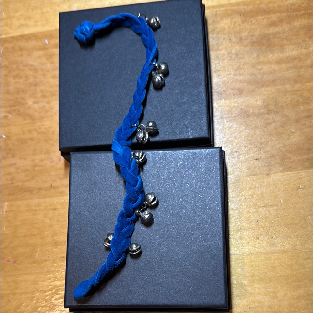 Blue Braided Bracelet with Silver Bells